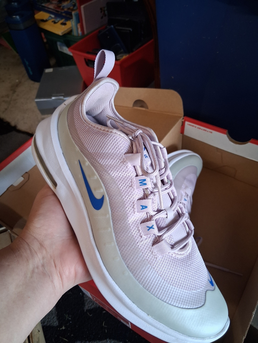 Nike Women's Light Pink Sneakers with Blue Swoosh